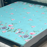 Printed waterproof mattress cover in aqua turquoise
