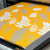 Printed waterproof mattress cover in mustard yellow